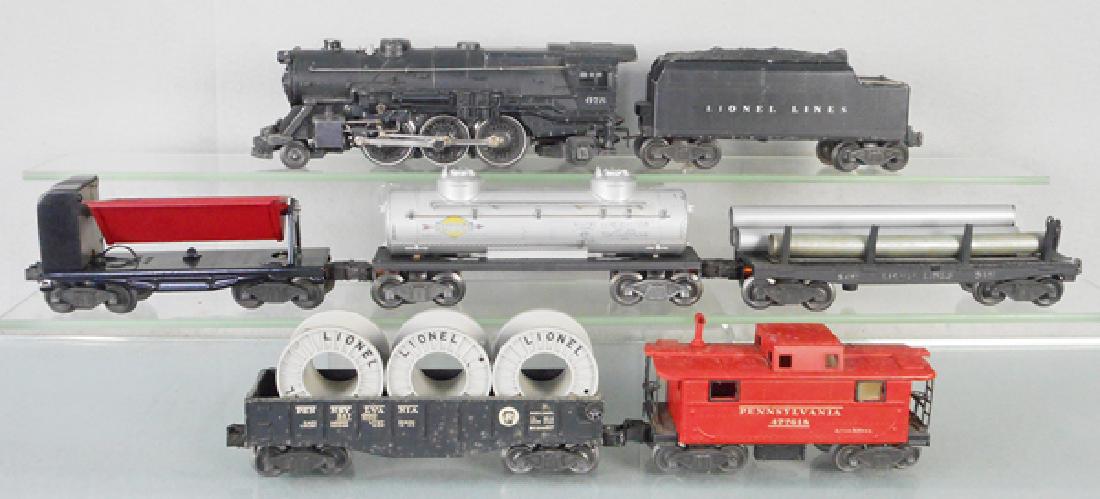 LIONEL TRAIN SET: O ga, 675 loco, nose decal worn, w/paint touch ups, 2466WX tender, w/chip, 3559 coal dump, restored, 3451 pipe flat, lettering worn, 2452 gondola w/cable reels, 2457 caboose, missing windows, C4-6.