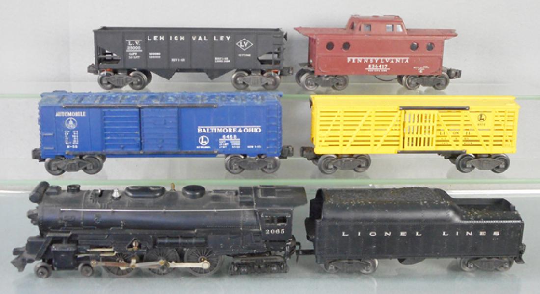 LIONEL TRAIN SET: O ga, 2065 loco, 2046W tender, 6468 B&O box car, 6656 stock car, minor chip to 1 catwalk end, 2456 LV hopper, 6417 caboose, some worn paint spots, minor chip on 1 end, 1 side scratched, missing both e
