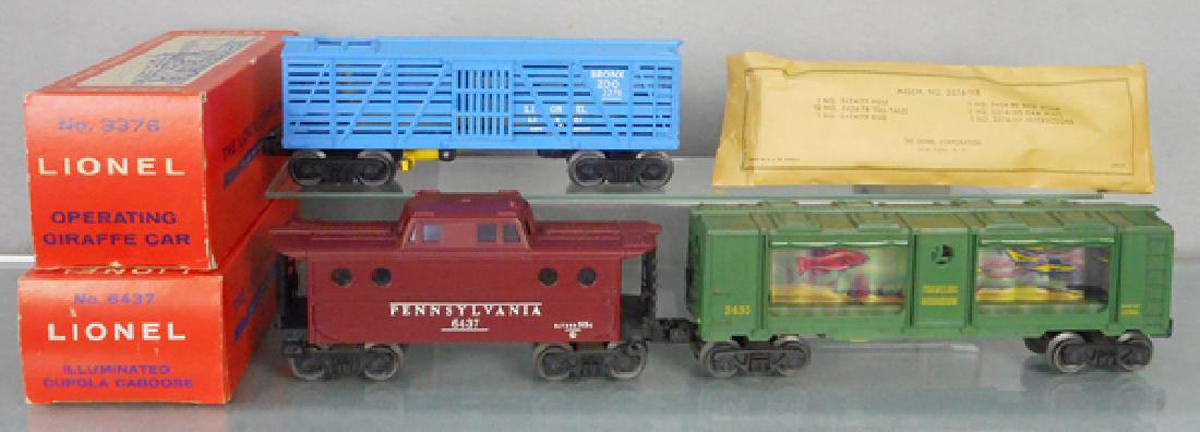 3 LIONEL FREIGHT CARS: O ga, 3435 aquarium car, 6437 PRR caboose, 3376 operating giraffe car, 2 orig boxes only, minor wear, C8-9.