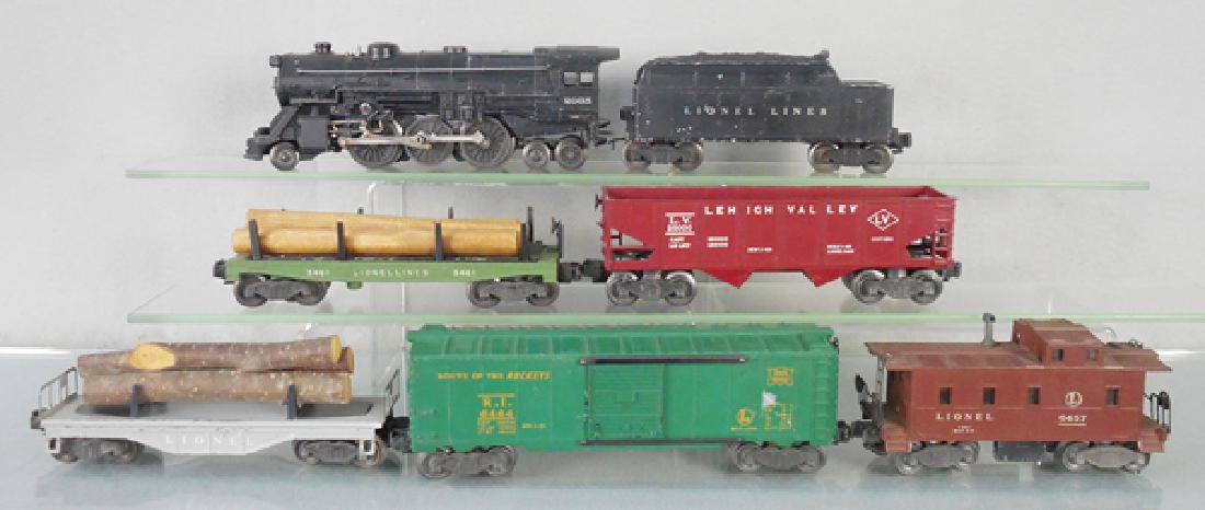 LIONEL TRAIN SET: O ga, 2035 loco, new boiler plate, 6466W tender, 3461 lumber dump, 6456 LV hopper, 6111 lumber flat, 6464 Rock Island box car, w/paint chip, 6457 caboose, C5.