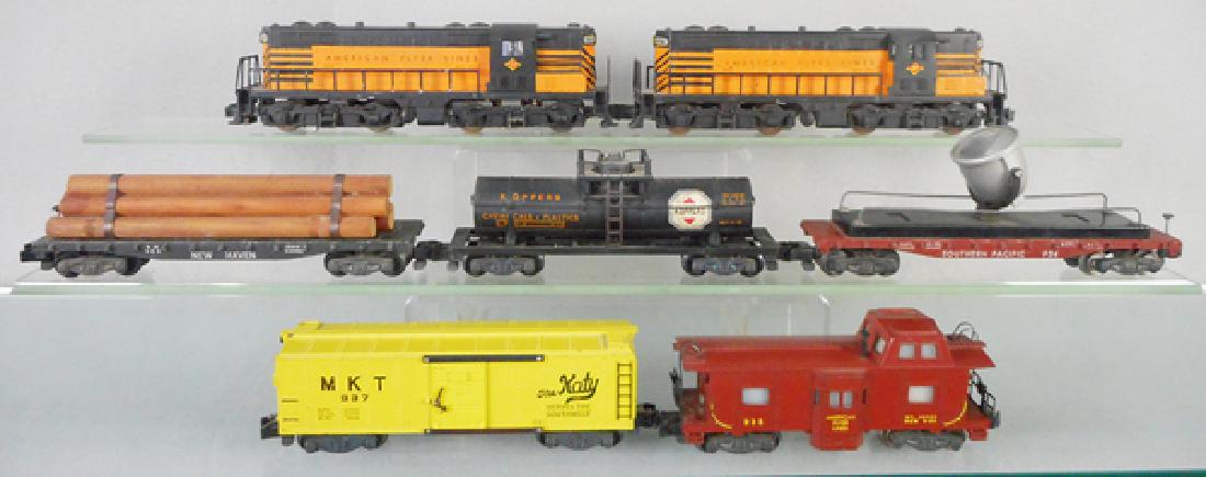 AMERICAN FLYER TRAIN SET: S ga, 374 & 375 T&P diesels, 928 lumber flat, 912 Koppers tank, 934 SP floodlight, 937 MKT box car, 935 caboose, C6-7.