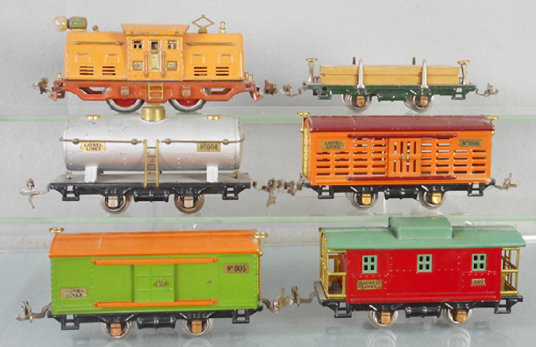 LIONEL TRAIN SET: O ga, 252 loco, 831 lumber flat, graffiti on bottom, 804 tank, 806 stock, 805 box car, 807 caboose, C6-7.
