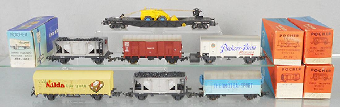 7 POCHER FREIGHT CARS: HO ga, flat w/bulldozer, 164, 310, 324, 321, 164, 312, 5 orig boxes only, minor wear, C8-9.