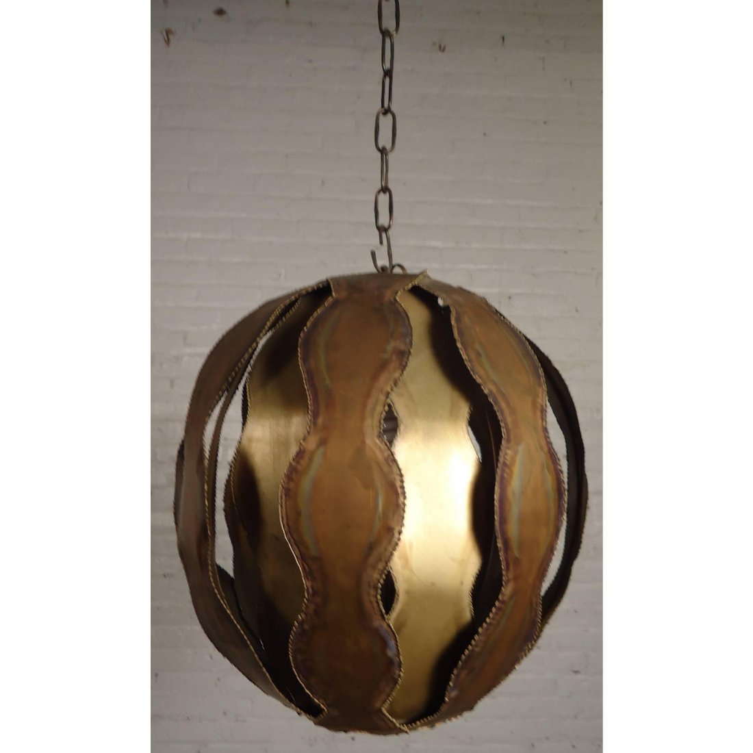 Tom Greene Mid-Century Torch Cut Brass Pendant: Vintage-Modern brass hanging globe-shaped pendant featuring one standard socket. Awesome torch cut metal with a handsome brutalist finish designed by Tom Greene.---Seller Reference Number0440-01294NZc