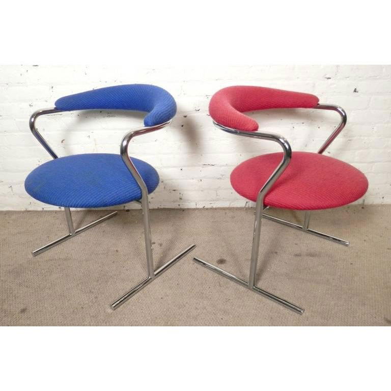 Anton Lorenz For Thonet Mid-Century Chairs: Pair of tubular chrome arm chairs designed by Anton Lorenz for Thonet. Sculpted polished chrome design with minimal modern style. ---Seller Reference Number9869-P9304459NRc---Condition: Good. Some sta