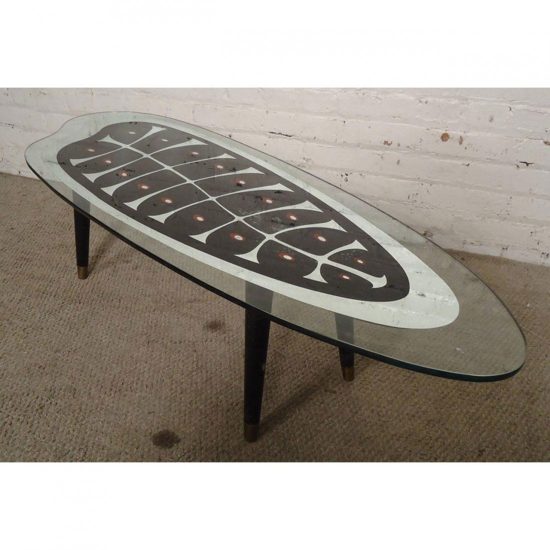 Rare Mid-century Mirrored Coffee Table: Vintage coffee table with mirrored glass top, features beautiful fern-like painted design in the style of Duilio Barnabé. Table set on black tapered legs with brass trim. ---Seller Reference Num