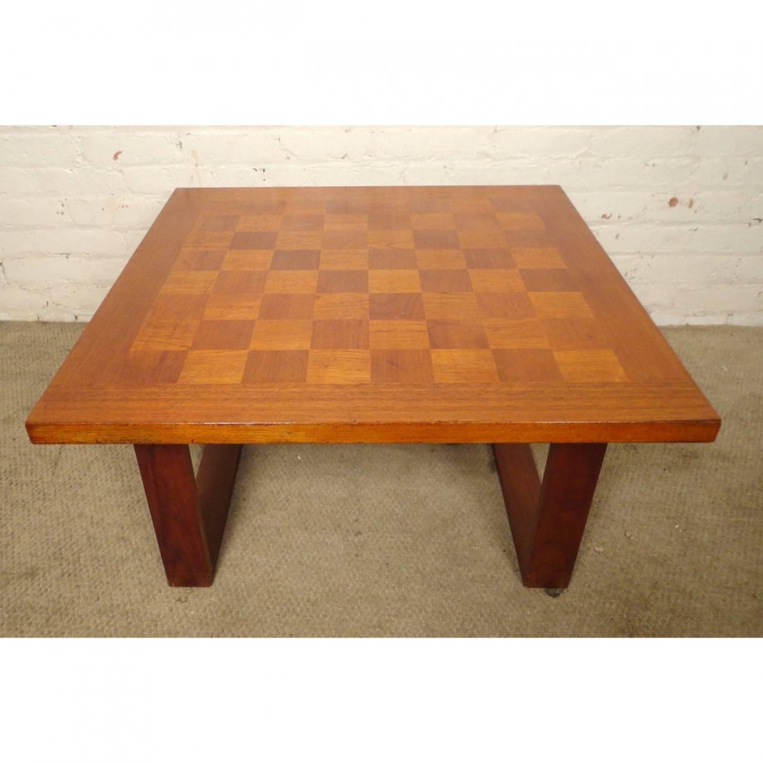 Mid-Century Parquet Top Table By Arne Vodder: Square coffee table with patchwork top designed by Arne Vodder. Set on sled legs with square dovetail joints. Solid design and construction. ---Seller Reference Number0231-00509Nc---ConditionGood. Som