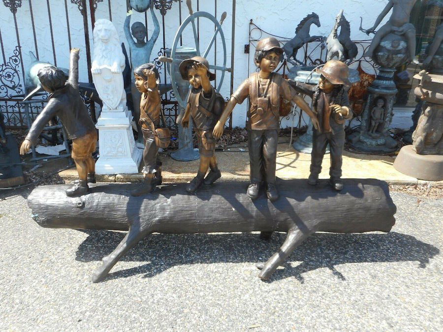 Bronze Statue of Children on a Log (1 of 4)