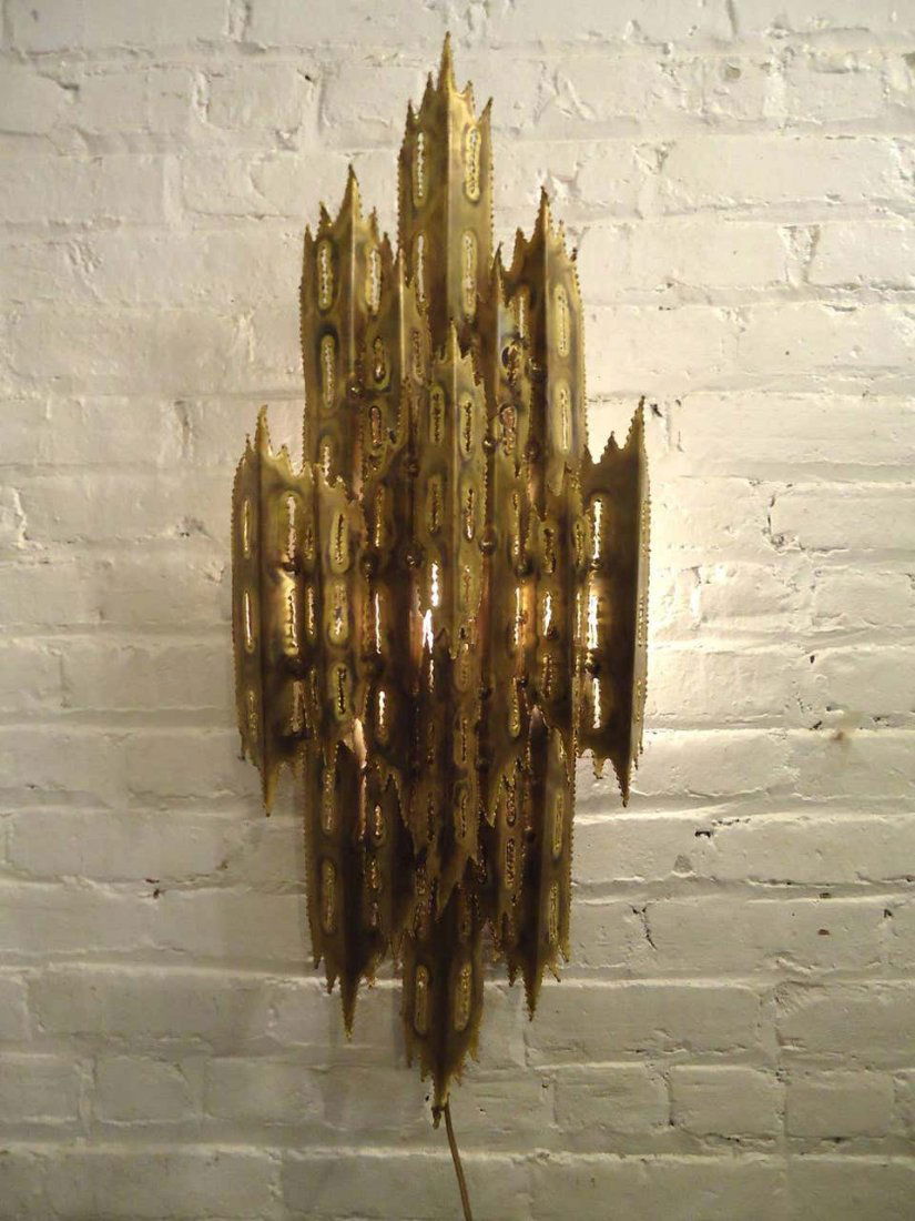 Brutalist Wall Sconce by Tom Greene: Awesome torch cut wall light with layered brass. Striking Paul Evans style with jagged metal design.---CONDITION DETAILSRe-wiring may be recommended for all vintage lighting. Vintage electrical and el