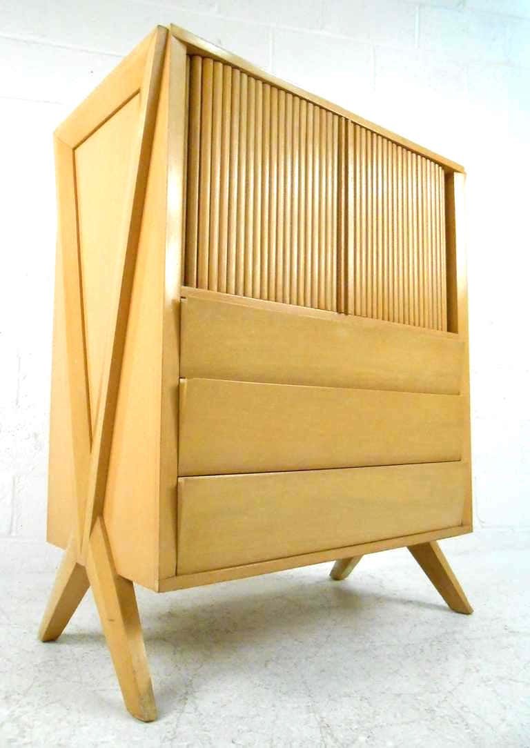 1-of-2 Tall Midcentury Dresser in Paul Laszlo Style: Dramatic midcentury dresser featuring bold "X-leg" design, tambour doors, and Paul Laszlo style design. This vintage sculptural dresser features six spacious drawers perfect for bedroom storage. ---CO