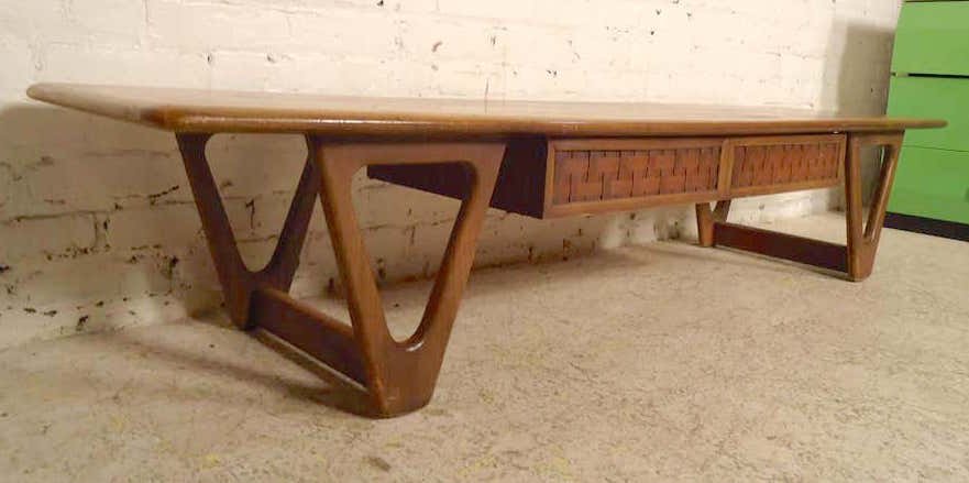 Mid-Century Modern Lane Coffee Table: This is a beautiful Lane coffee table from the Mid-Century. It is from the Perception line and was designed by Andre Bus. It has a drawer under the center of the table with a basket weave design drawe
