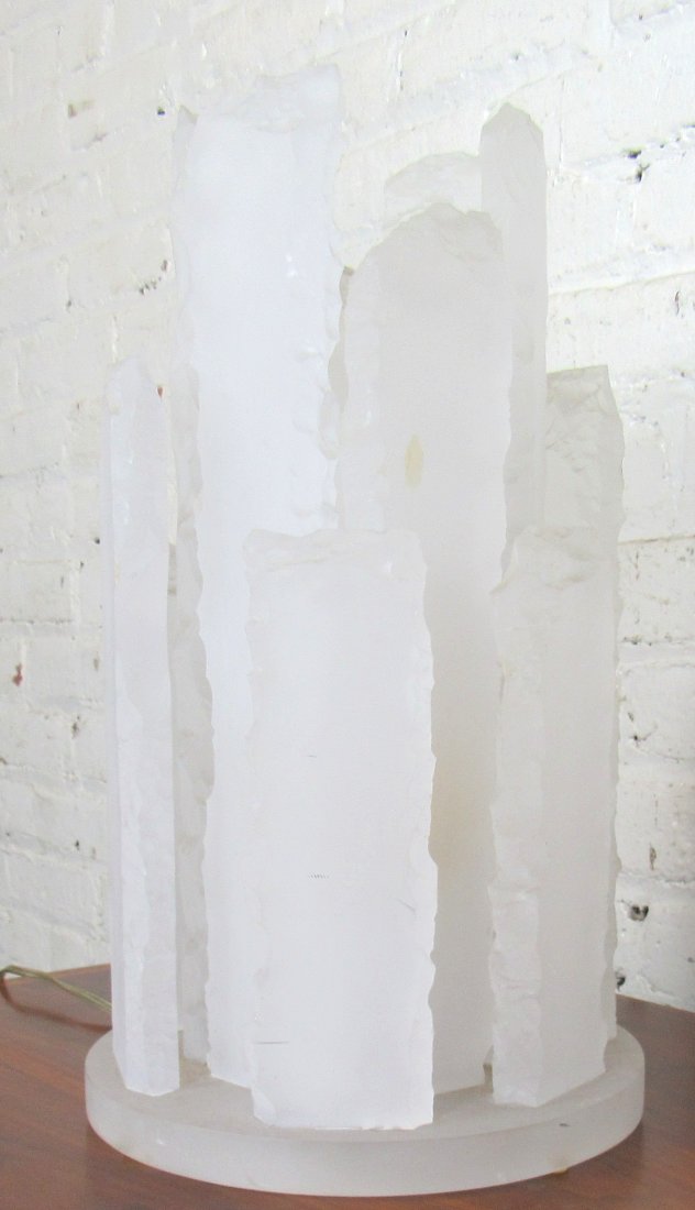 Van Teal "Ice" Lamp: Mid-century modern table lamp by Van Teal. Made of thick lucite to resemble cut ice. Medium base bulb sits in the middle for a nice shaded glow.--DIMENSIONS: 10"dia, 17"h--LOCATION: Brooklyn NY--CONDI