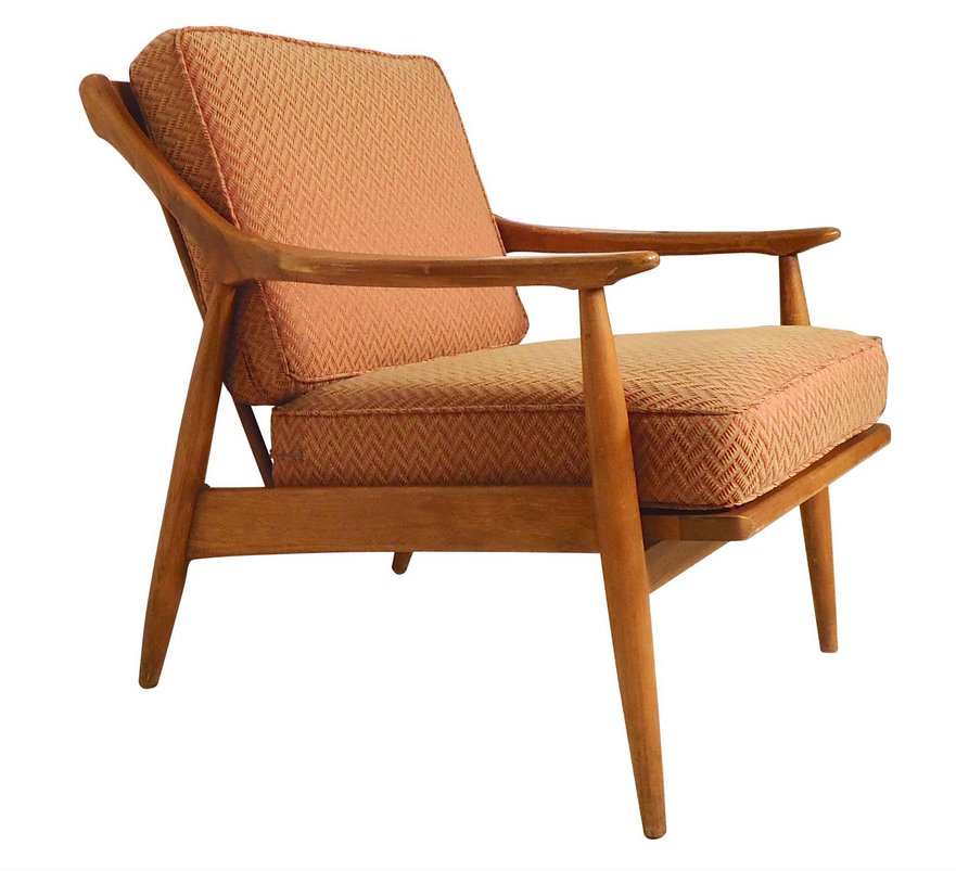 Ib Kofod-Larsen Inspired Armchair, 1960: Mid-Century Modern walnut armchair featuring the same angular design Larsen used for his line with Selig. Spindled back that angles down, sculpted arms, tapered legs. // PICK UP LOCATION: Brooklyn NY