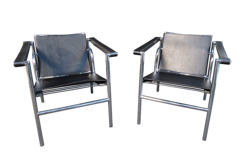Cassina Style Sling Chairs in Leather and Chrome: This vintage pair of leather and chrome sling chairs are styled after the designs of Cassina, and feature an elegant comfortable design. // PICK UP LOCATION: Brooklyn NY // Dimensions: Height: 25 in.