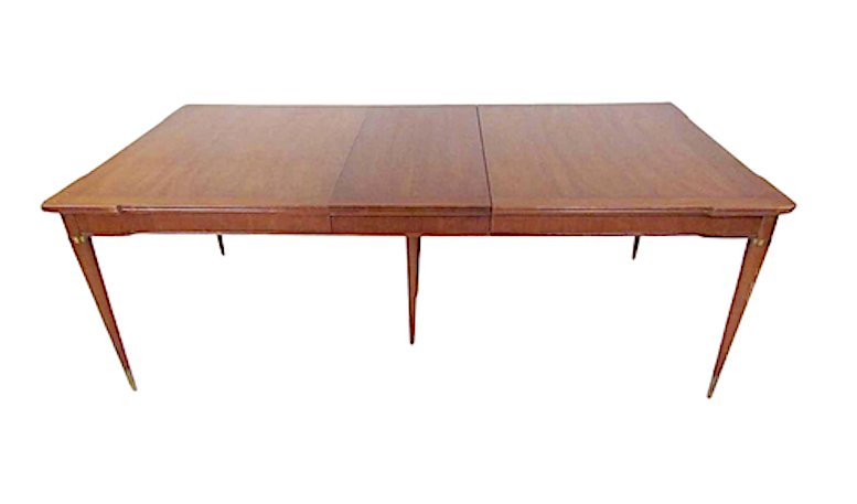 J. Stuart Clingman Dining Room Table: This stylish large dining table by J. Stuart Clingman for Widdicomb comes with three leaves. Extendable dining table opens from sixty-six inches wide to 110 inches wide with all three leaves in place.