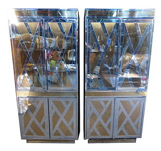 Cabinets by Ello: Brass and bronzed mirror tall boy or bar cabinet designed by O. B. Solie for Ello Furniture for their Regency Imperial collection circa 1985.One-piece unit styled as a chest on chest. Double doors abo