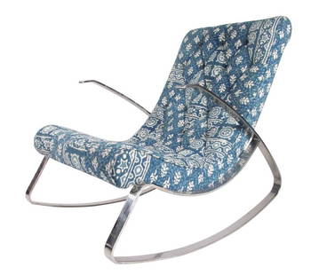 Mid-Century Flat Bar Rocking Chair: This stylish midcentury rocking chair features heavy flat chrome construction and shapely frame design. Unique patterned upholstery is tufted for added style, plush padding makes this a comfortable vi