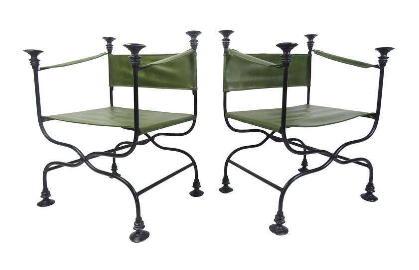 Iron Safari Chairs: This unique pair of chairs look great in any home, business, or office. The sleek design boasts vinyl straps for armrests, seating, and the backrest. A stylish and sturdy chair with an extremely heavy