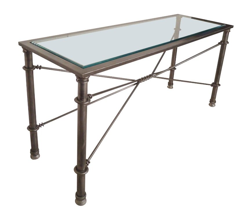 Metal Console Table with Beveled Glass: Unique table made of strong metal with a thick beveled glass top. Attractive twist design, great for entry way. // PICK UP LOCATION: Brooklyn NY // Dimensions: Height: 29 in Width: 56 in Depth: 18 in 