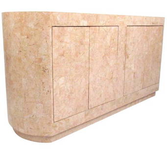 Tessellated Stone Buffet in the Manner of Maitland Smith: Salmon colored four-door tessellated stone buffet with two storage drawers and two adjustable shelves. A smaller-scale cabinet that can be used as a buffet, a console cabinet behind a sofa, or as a fr