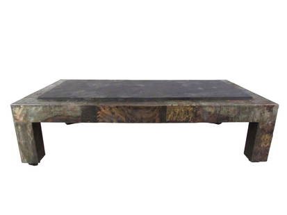 Paul Evans Patchwork Metal and Slate Coffee Table: This stunning Mid-Century table uses a combination of patchwork hammered metal to create a stunning effect. Vintage slate top wonderfully compliments the piece, while low profile casters make it easy