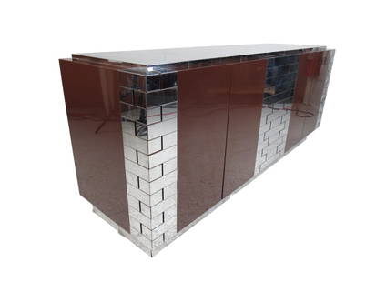 Midcentury Paul Evans Brutalist Sideboard for Directional: An iconic vintage modern design by Paul Evans with an elaborate chrome patchwork design. This stylish case piece boasts a spacious black interior hidden behind four cabinet doors. A two-tone design wi