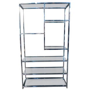 Chrome and Glass Etagere by Milo Baughman: A stunning chrome and glass etagere in the style of Milo Baughman from the mid-century modern era. Features six shelves, four full-width and two half-width. In great condition, a truly beautiful piece