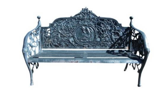 Ornate Floral Cast Iron Bench: This elegant cast iron bench features sculpted sloped arm rests, slatted seat and a beautiful floral design . A unique and comfortable design with excellent detail throughout. Splayed legs and a decor