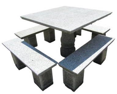 Stone Garden Set: Table and four benches made of stone for outdoor use. // PICK UP LOCATION: Wall, NJ // Dimensions: Table-35.5w, 35.5d, 26h / Benches-35.5w, 10d, 14h // Condition: outdoor wear, fading, scratches, mino