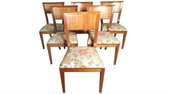 Set of 6 Art Deco Floral Dining Chairs: Six sculptural hard maple dining chairs in the unmistakable art deco style. Beautiful floral upholstery is attached with elegant brass buttons while a gently bent backrest offers universal support. Su