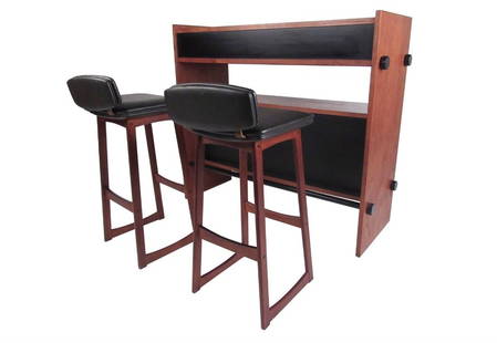 Vintage Teak & Leather Scandinavian Bar Set: This stunning mid-century modern dry bar features teak construction and comes paired with matched low back thirty inch bar stools. Natural teak finish with black laminate fronts, the stylish yet under