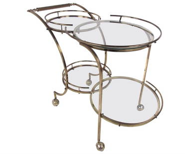 Vintage Hollywood Regency Brass Bar Cart: This vintage Italian brass bar cart features elegant lines and four tier circular shelves for storage and service. Stylish Mid-Century serving cart boasts slender elegant frame and hardwood handle, ma