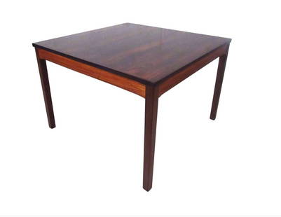 Mid-Century Rosewood Coffee Table by Haug Snekker for Bruksbo Norway: This Norwegian rosewood coffee table by Bruksbo offers a rich natural rosewood finish, with wonderfully banded lightened side supports. Quality midcentury construction makes this vintage table a uniqu