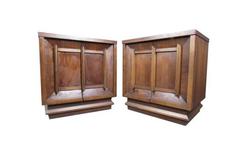 Midcentury Sculpted Walnut Nightstands: Fantastic pair of substantial vintage walnut nightstands with elegant sculpted doors. Blending brutalist and Asian design influences, this simple yet timeless design is sure to fit in seamlessly with