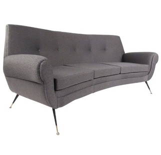 Vintage Italian Modern Sofa by Gigi Radice: This stunning three-seat sofa features sculpted seat back and armrests, designed by Gigi Radice. Featuring tapered brass legs, comfortable seating proportions, and newer tufted fabric. Stylish pair