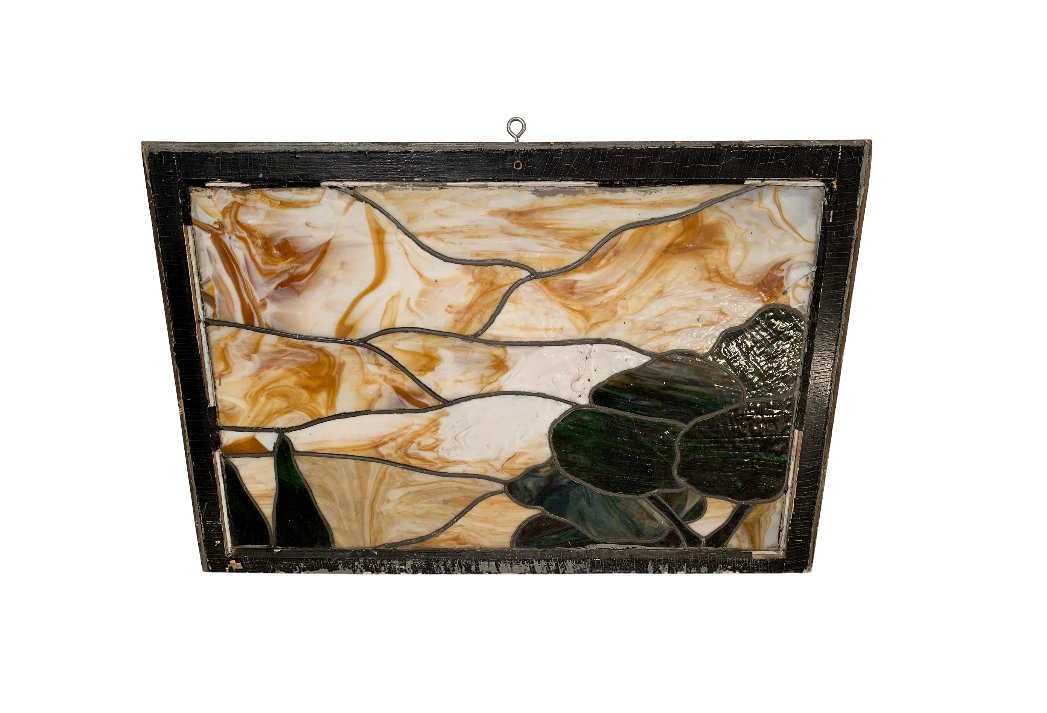 Mid 20th Century Tree Scene Stained Glass Window: Vintage stained glass window depicting swirling tree scene.Dimensions: w40" x d1.75" x h 27"Condition: age appropriate wear, dings, dents, cracks, loss, restoration recommendedSeller Reference # SG10-