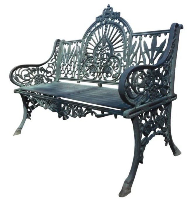 Sculpted Cast Iron Bench: This beautiful cast iron bench features sculpted arm rests, an arched backrest, and a slatted seat. A unique and comfortable design with excellent detail throughout. // LOCATION: Brooklyn, NY // Dimen
