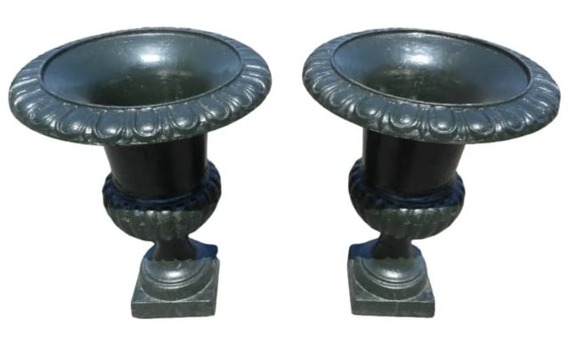 Cast Iron Urns (Pair): Beautiful pair of cast iron urns. Sturdy construction with a green painted finish. Decorative trim around the lip of the urn and the body give this pair a great look. Sure to prove a great addition to