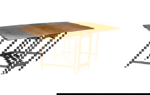 Bendt Winge Designed Drop Leaf Dining Table: This mid-century modern teak dining table is perfect for your small apartment or extra hosting space. With two leaves that fold, it can go from 14" wide up to 64". Each side has two scissor like suppo
