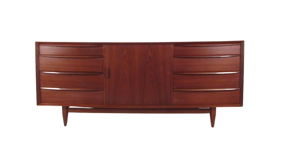 Danish Modern Dresser by Arne Wahl Iversen: Quality teak Danish modern dresser by Arne Wahl Iverson for Falster. Beautifully designed with multiple storage options, curved drawer pulls, dovetail construction, and tapered legs // PICK UP LOCATIO