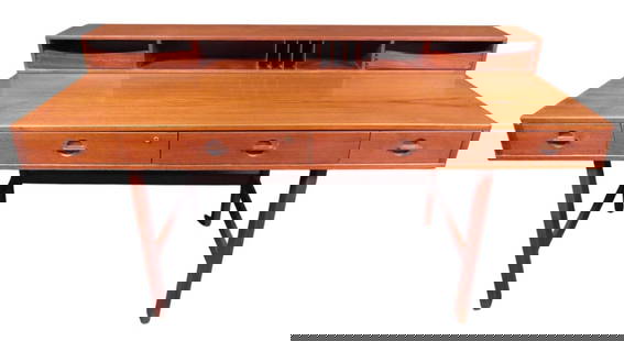 Danish Executive Desk by Peter Lovig Nielson: With a convertable hutch that folds down, multiple drawers for storage, and rich teak wood, this desk by Peter Lovig Nielson is a Mid-Century Modern gem. // Pickup location: Brooklyn, NY // Dimensions