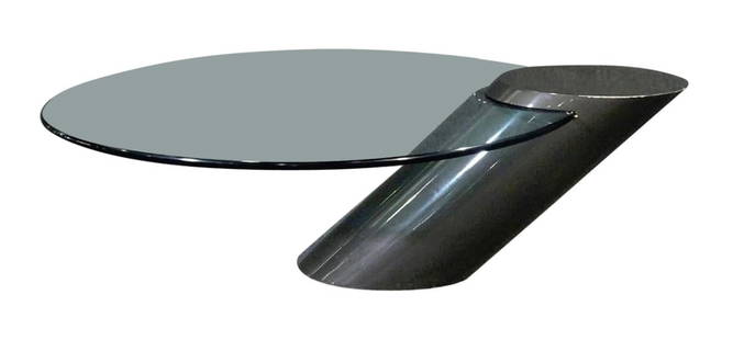 Cantilevered Glass Cocktail Table by Brueton: Oval glass set into a lacquered angled base. Designed by J. Wade Beam for Brueton. // Pickup location: Brooklyn, NY // Dimensions: Height: 16 in (40.64 cm)Width: 49 in (124.46 cm)Depth: 34 in (86.36 c
