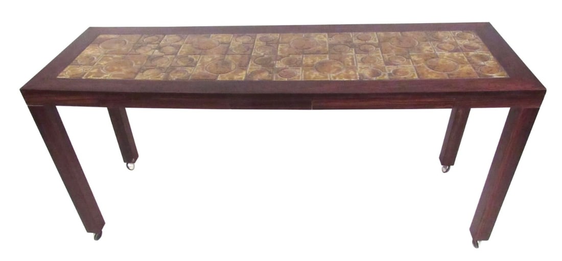 Danish Modern Rosewood Console Table with Tile, Inlay: This stylish vintage console table features rosewood construction and unique tile inlaid top. Two dovetailed drawers provide occasional storage, while sturdy casters make it easy to maneuver this Pars