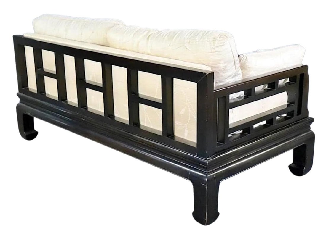 Michael Taylor for Baker 'Far East' Loveseat: Mid-century modern loveseat with black frame in an Asian motif. Soft cushions sit over a covered back. Michael Taylor designed sofa for the Baker Far East collection. Ebonized lattice back and frame w
