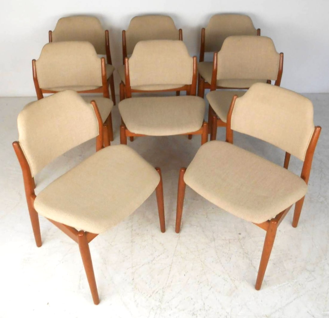 Arne Vodder Model 62s Dining Chairs: Eight dining chairs by Arne Vodder in teak wood. // PICK UP LOCATION: WALL NJ // Dimensions: Height: 31.5 in Width: 22 in Depth: 17 in Seat Height: 18 in // Condition: Wear consistent with age and use