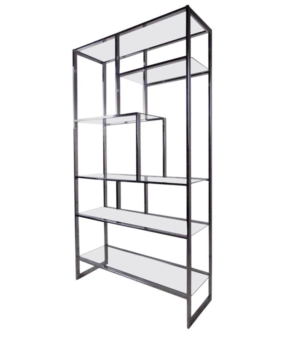 Mid Century style DIA Étagère in Chrome and Glass: Vintage modern style étagère featuring sculpted chrome body with glass inserts, designed by Design Institute of America. Ideal for any living room or store display this shelving unit adds a brillian