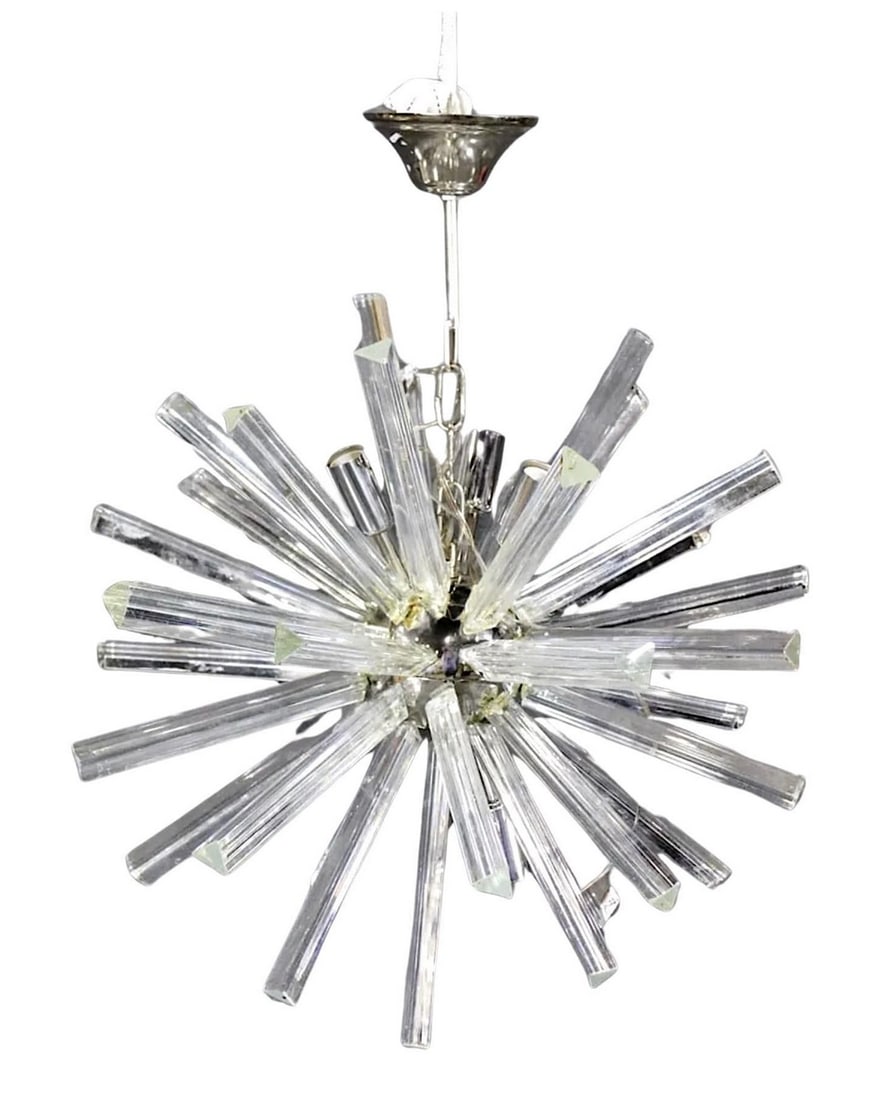 Glass Prism Sputnik Chandelier: Mid-century modern hanging Sputnik style chandelier with glass prisms. Polished chrome frame and candelabra sockets surrounded by clear triangular glass prisms that help distribute the light. // 