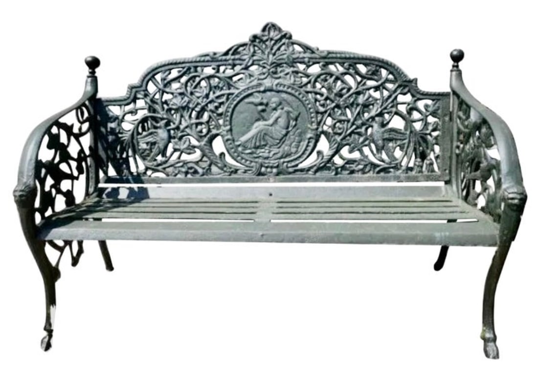Ornate Floral Cast Iron Bench: This elegant cast iron bench features sculpted sloped arm rests, slatted seat and a beautiful floral design . A unique and comfortable design with excellent detail throughout. Splayed legs and a
