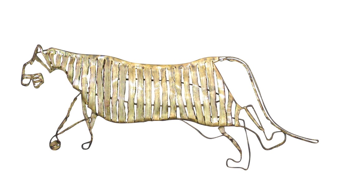 Handmade Brutalist Brass Metal Tiger by A. Phillips c. 1974: Add a wild, vintage touch to your home decor with this stunning brutalist metal tiger. Torch cut brass has been artisanally welded to create a beautiful piece that is equal parts natural and