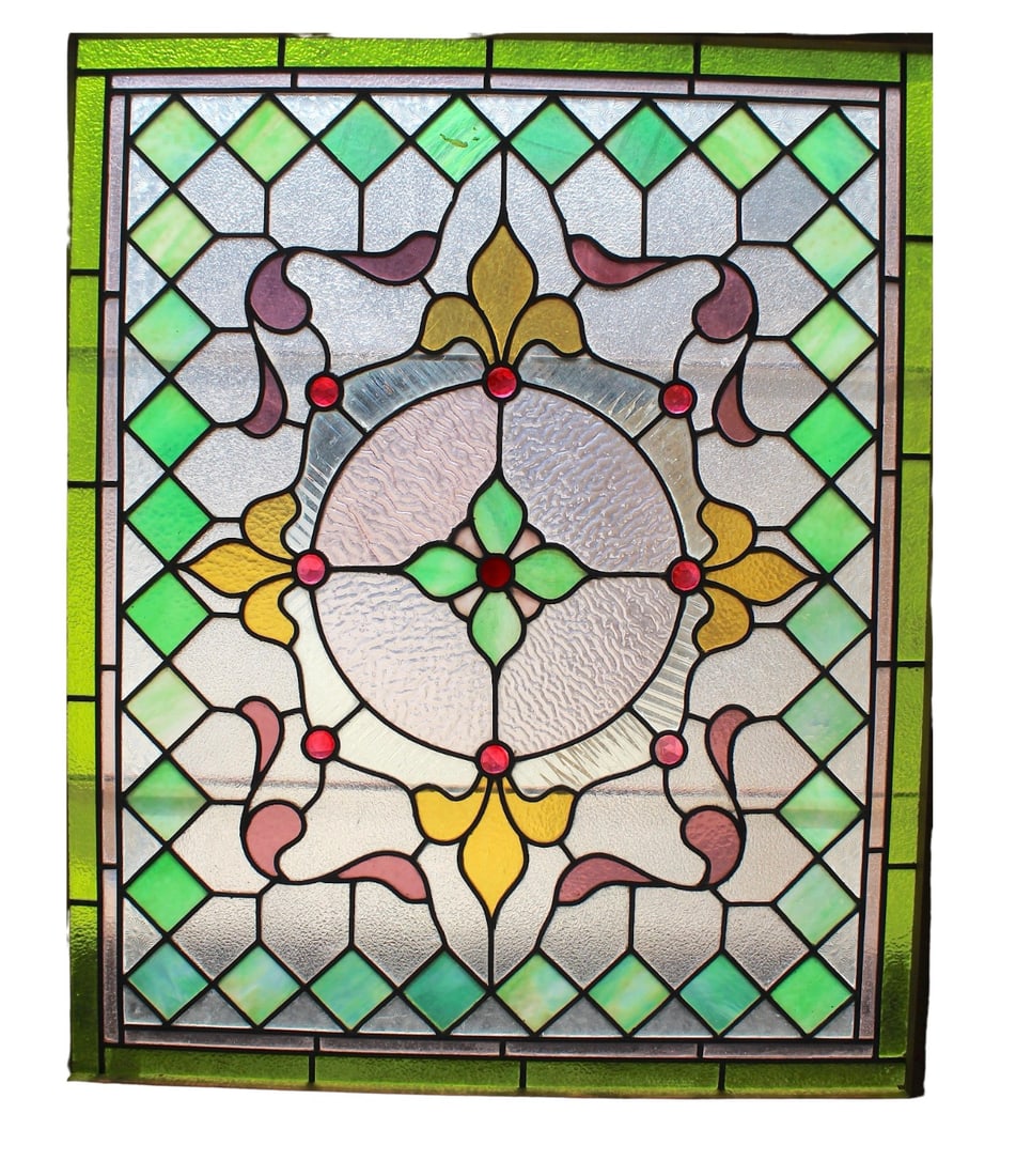 Jeweled Stained Glass Window: Almost squared window with superb stained glass designs. Colored and textured glass with raised "jewel" pieces in a leaded design. Currently housed in a wooden frame - the overall dimensions are for
